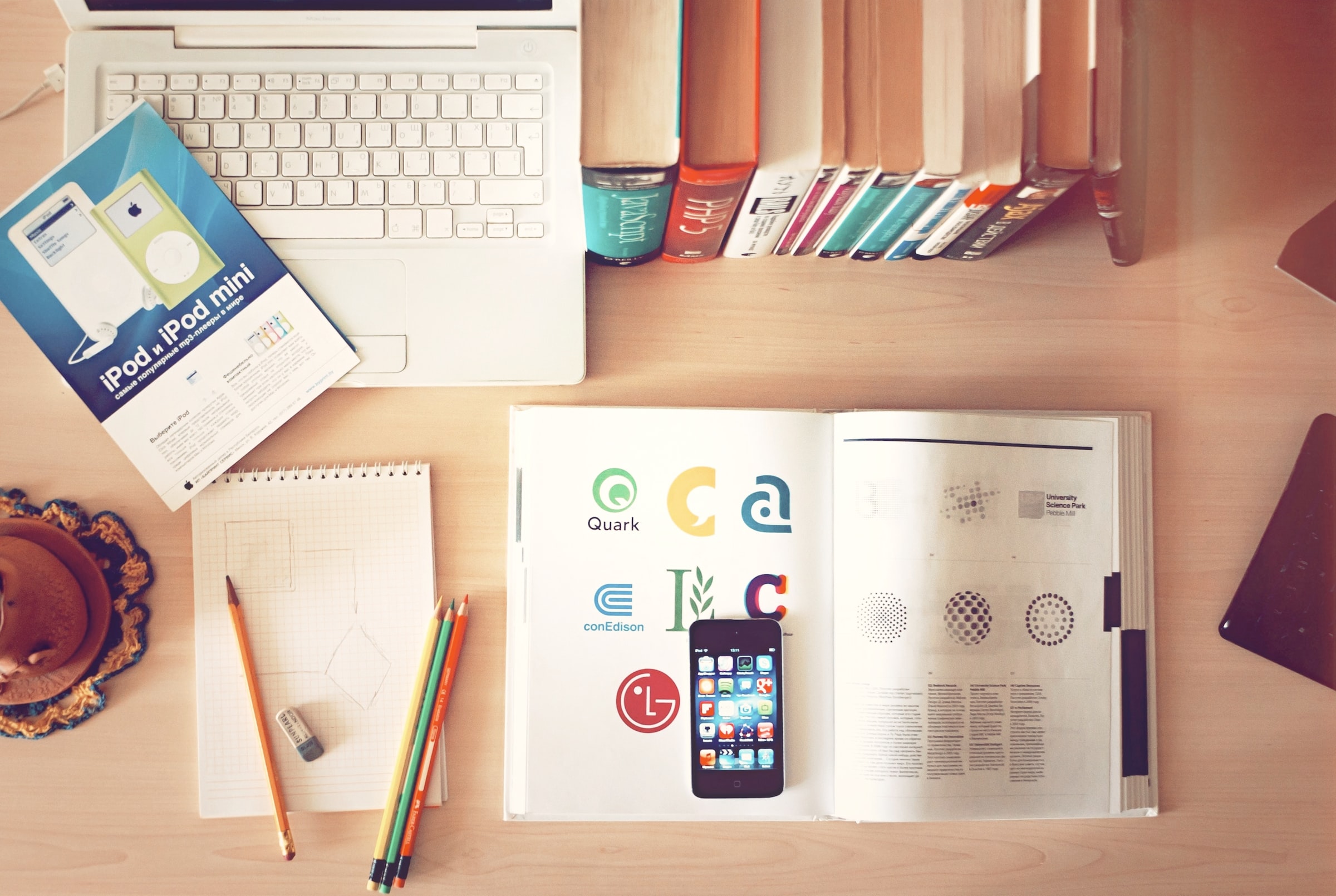 desktop with books and laptop